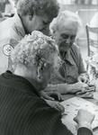 Black and white photograph of Welfare services at a club for Elderly Stroke patients