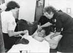Black and white photograph of Nursing for the Family