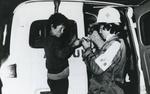 Black and white photograph for World Red Cross Day 1979 - Night-time medical patrol operated by Colombian Red Cross Youth volunteers