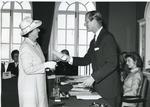 Black and white photograph of the Duke of Edinburgh presenting the Florence Nightingale Medal to Gwyneth Ceris Jones July 1971