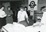 Black and white photograph of an image from 'Nursing for the Family'