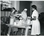 Black and white photograph of the disaster relief store at the Jamaican Red Cross