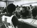 Black and white photograph of activities of the Portuguese Red Cross Youth