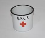 Tin mug displaying the Red Cross emblem