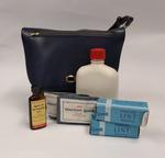 First Aid kit in navy blue plastic shoulder bag