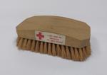Hairbrush with sticker: 'A gift from the Australian Red Cross Society'