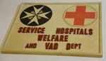 Wooden sign: 'Service Hospitals Welfare and VAD Dept'