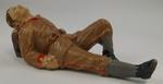 Small model of resting soldier, unknown uniform