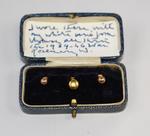 Three gold uniform studs in a leather box, belonging to Rosemary Winstanley