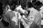 British Red Cross nurse vaccinating a displaced person in Bangladesh